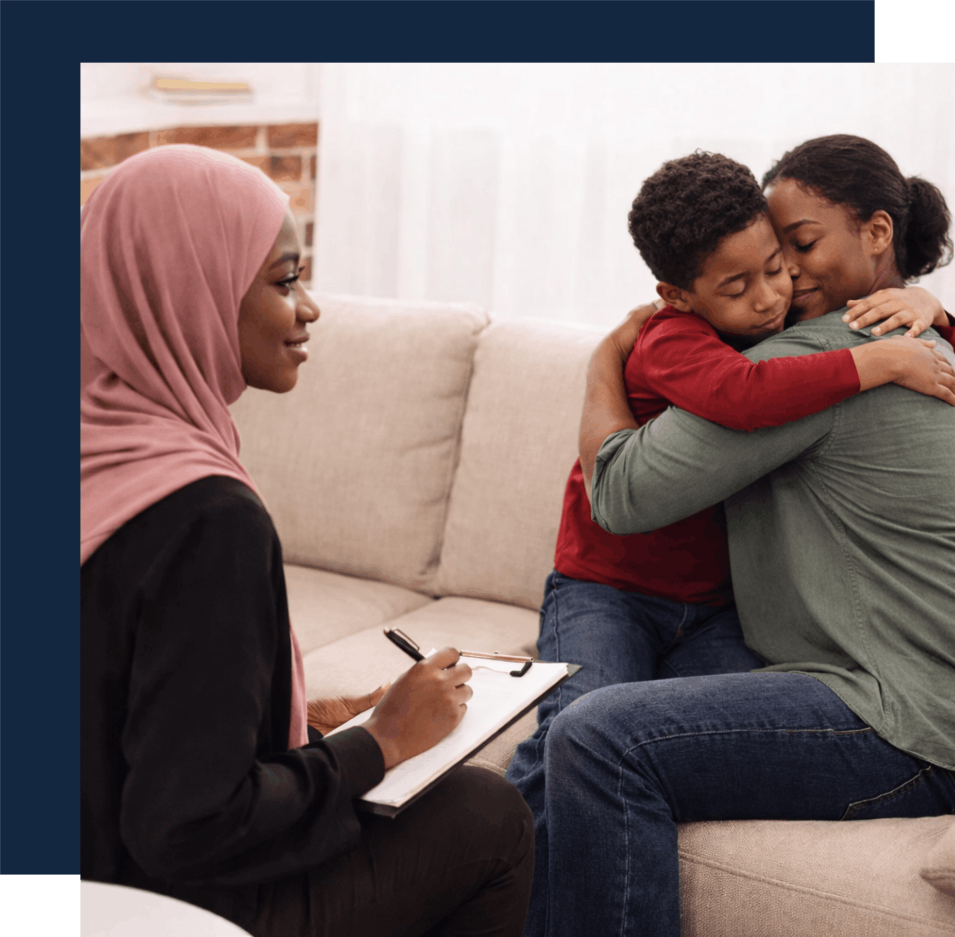 therapist observing a mother and a child embrassing