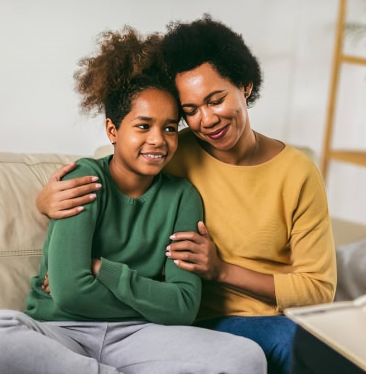 parent hugging teenager in therapy (1)